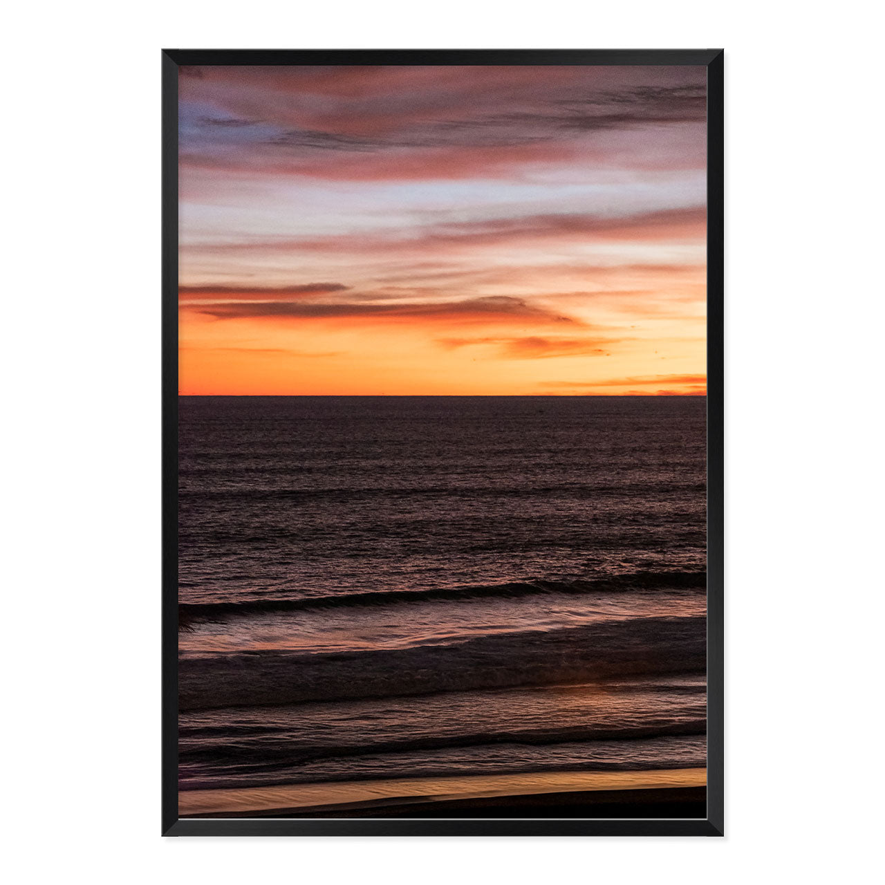 Framed artwork of a sunset over water with a frame.