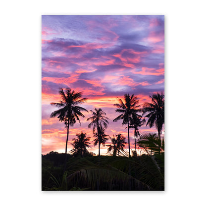 Artwork of palm trees against a vibrant purple and pink sunset sky.
