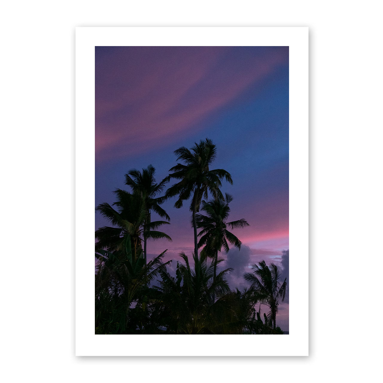 Artwork of palm trees against a purple sky