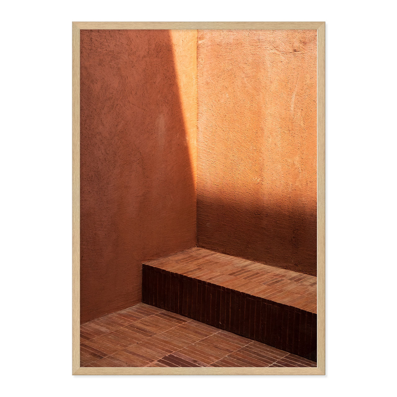 Wooden bench against a textured brown wall with a light wood frame.