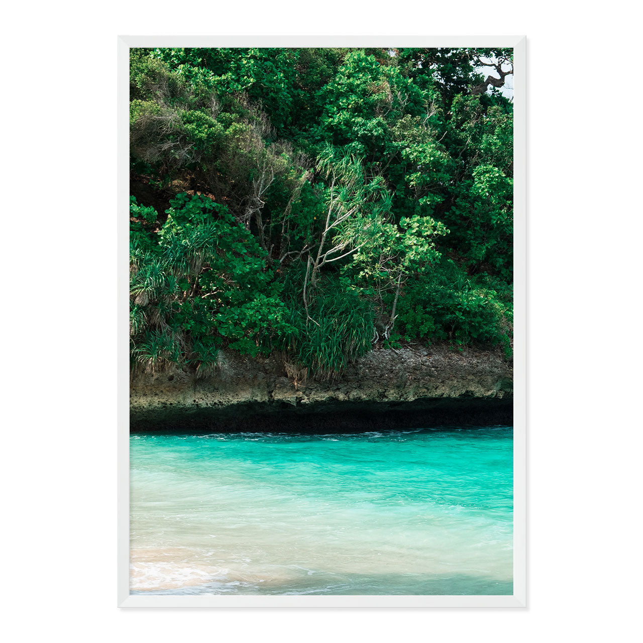 Framed artwork of a tropical landscape with greenery and turquoise water.